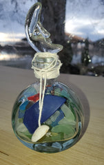 SET OF 2 BOTTLES OF SEA GLASS AS SHOWN