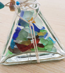 SET OF 2 BOTTLES OF SEA GLASS AS SHOWN