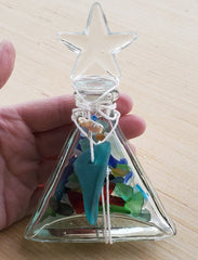 SET OF 2 BOTTLES OF SEA GLASS AS SHOWN